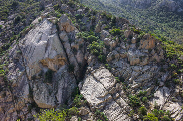 Obraz premium Gigantic rock formations between the forests in the Gorropu canyon, the most important natural site in Sardinia, Italy