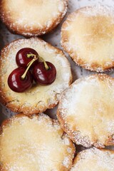 Delicious cupcakes with cherry jam on the table 
