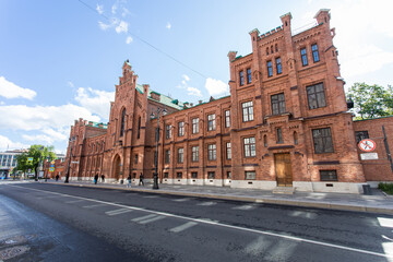 Fototapeta na wymiar Red brick house in the center of St. Petersburg