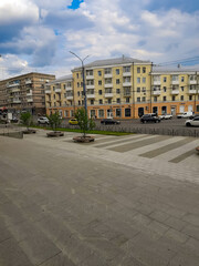 Naklejka premium Urban landscape, cars, buildings, tram.