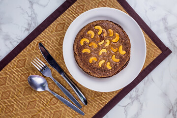 Brownie cake on wooden plate