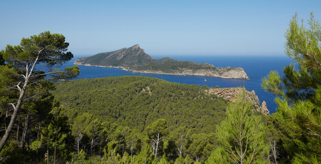 Fototapeta na wymiar Panoramic of the Torre de Cala en Basset and the island of Sa Dragonera, taken from La Trapa, an old monastery located in San Telmo, Spanish municipality of Andrach, in Mallorca, Spain