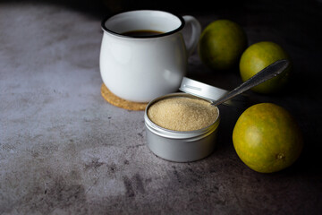 dried monk fruit, luo han guo, and monk fruit sugar crystals accompanied with a cup of tea or coffee