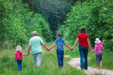 Obraz premium happy big family on summer walk in nature