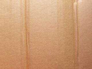 Fototapeta premium Beige cardboard box textured background with wrinkles