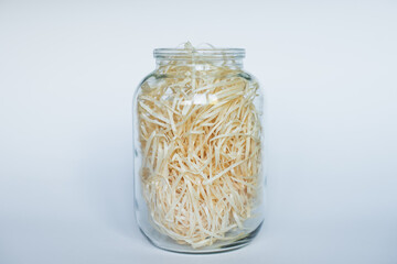 Beautiful transparent jar full sawdust