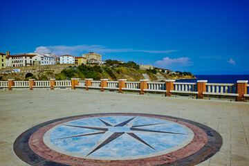 Naklejka premium City panorama with the compass rose of Piazza Bovio Piombino Tuscany Italy