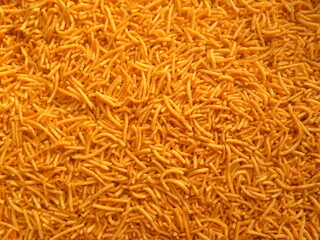 Orange color Sev Indian fried snack