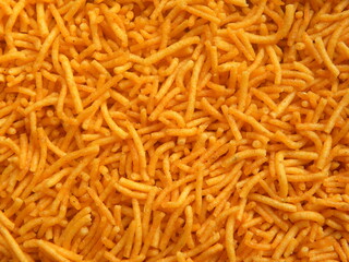 Orange color Sev Indian fried snack