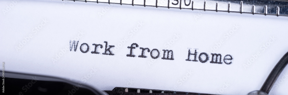 Fototapete work from home. text written with a old typewriter. panoramic image