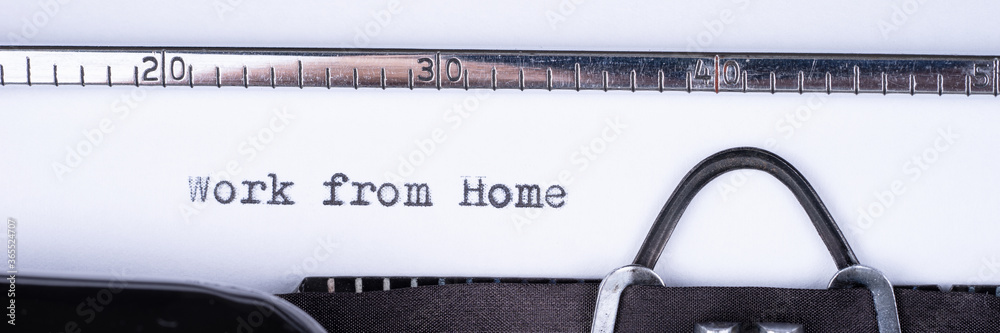 Fototapete work from home. text written with a old typewriter. panoramic image