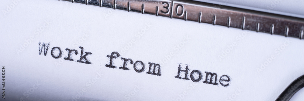 Fototapete work from home. text written with a old typewriter. panoramic image