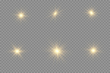 Fototapeta na wymiar Set of bright Star. Yellow glowing light explodes on a transparent background.