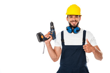 Smiling repairman showing like gesture and holding electric screwdriver isolated on white