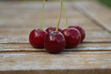 cherries on a wooden table