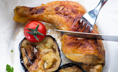 Roasted chicken legs with vegetables