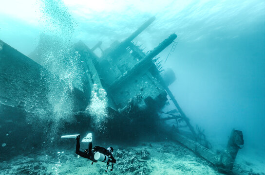 scuba diver and wreck 