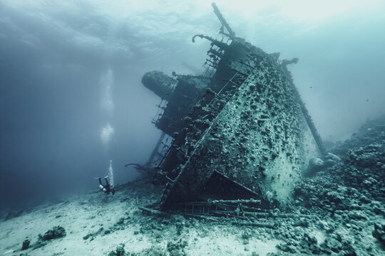 Old wreck lying on the bottom of the sea 