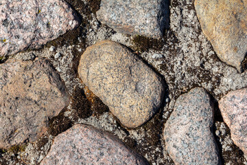 Cement wall with stones background