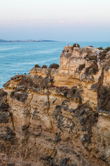 Algarve, Lisbon. Beautiful bay near Lagos town with high cliffs on the shore of the Atlantic Ocean. The Algarve is the southernmost region of continental Portugal. 