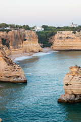 Obraz premium Algarve, Lisbon. Beautiful bay near Lagos town with high cliffs on the shore of the Atlantic Ocean. The Algarve is the southernmost region of continental Portugal. 