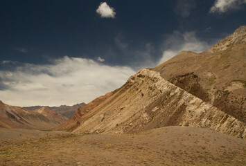 Geology. The beautiful valley, yellow meadow, mountains and rocky formations. 