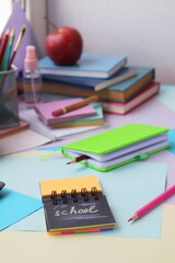 School stationery, on the desk, home schooling concept, part of the interior of a children's room, back to school