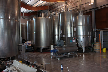 Naklejka na ściany i meble wine making tanks in a winery in Italy 