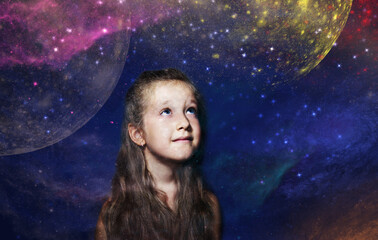 Childhood and dream concept. Conceptual image with girl dreaming about space, stars, planets.