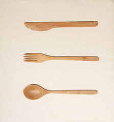 Handcraft  wooden spoon, fork and knife  on isolated white background, Sao Paulo, Brazil