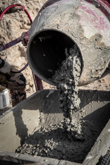 Concrete mixer at a construction site.