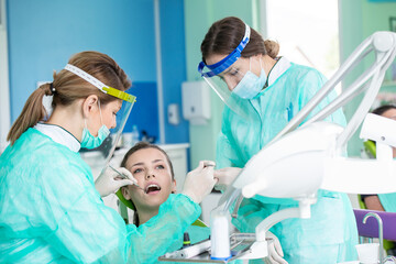 Dentist and patient in dentist office