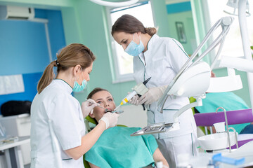 Dentist and patient in dentist office