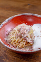 Pasta, spaghetti with bacon and cheese mousse