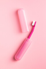 New pink toothbrush in case