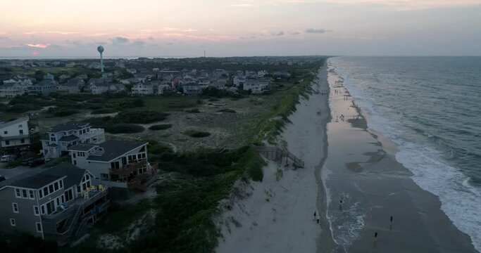 Corolla beach coastline in the outer banks. Aerial drone shot at sunset.