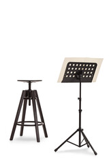Studio shot of a black chair and a music notebook on a stand