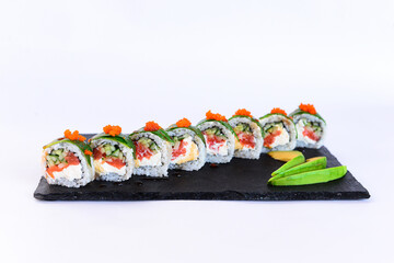 Sushi rolls on white plate japanese cuisine ginger
