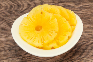 Marinated pineapple rings in the bowl