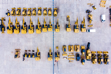 heavy construction equipment store. excavator, bulldozer, grader, front loader. Aerial view