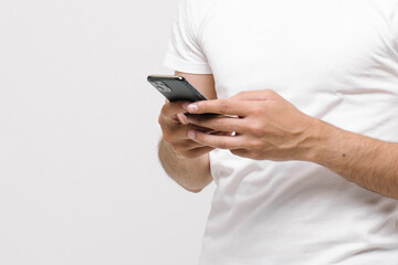 Touch screen mobile smart phone in male hands.