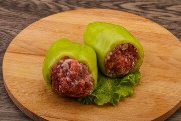 Raw stuffed pepper for cooking