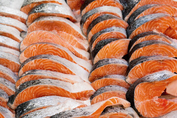 Fresh raw salmon red fish steak. Sale of fresh seafood.