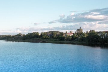 Fototapeta na wymiar Ladoga Lake with Stone Embankment in Sortavala