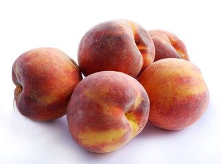 gold and red,tasty peaches close up