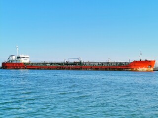 Aerial view container cargo ship, import export commerce business trade logistic and transportation of International by container cargo ship boat in the open sea, Freight shipping maritime.