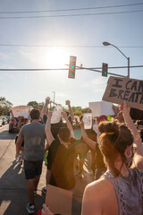 Black lives matter protest during COVID-19 with people wearing masks