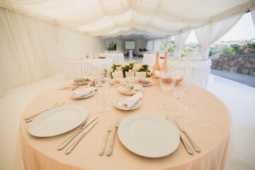 Beautiful Banquet hall under a tent for a wedding reception.