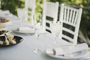 Beautifully decorated tables for guests with decorations