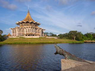 Sarawak New Parliament building with bronze dragon statue in Kuching, Malaysia